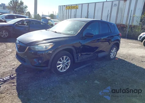 2014 Mazda Cx-5 Touring z USA, uszkodzony, nr VIN JM3KE4CY9E0309225